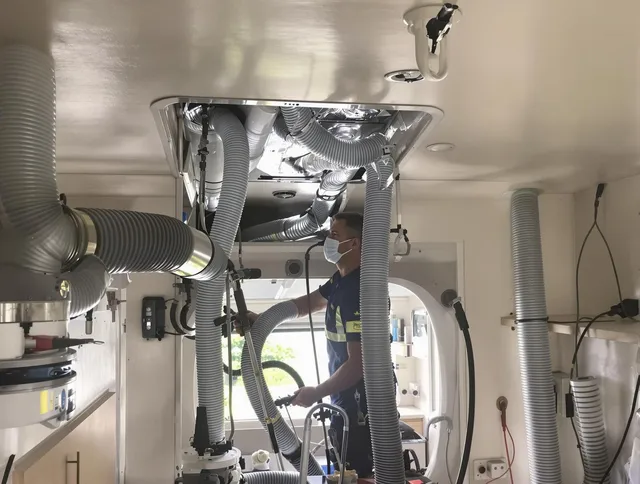 Holbrook Air Duct Cleaning specialist performing precise mobile home duct cleaning in Holbrook