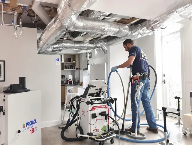 Holbrook Air Duct Cleaning technician performing advanced pure duct cleaning with specialized equipment in Holbrook